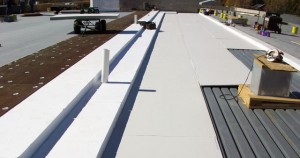 Installation of Benchmark Foam Roofing Insulation